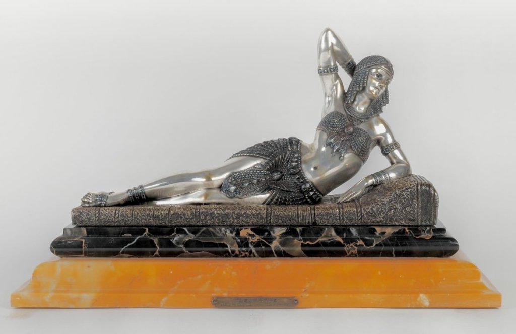 Cleopatra statue in silvered and enameled bronze on a portor and yellow Sienna marble.