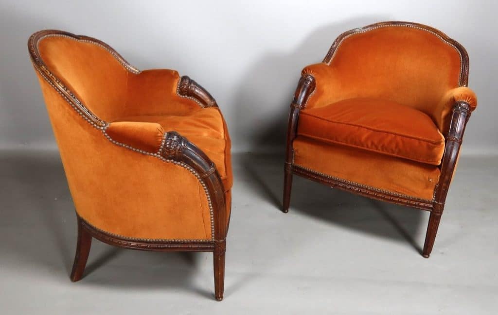 Art Deco armchairs by Paul Follot. Mahogany, cornucopia for the armrests. Similar model at the Musée d'Orsay.