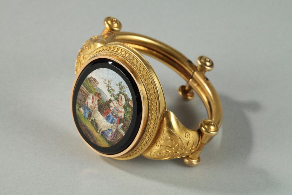 Italian pastoral scene in micro-mosaic inspired by Francesco Londonio in Etruscan revival gold mount reminiscent of Castellani's work. Circa 1860-1870.