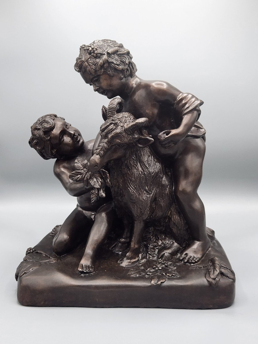 Putti And Goat Proof In Bronze With Brown Patina. Signed On The Terrace