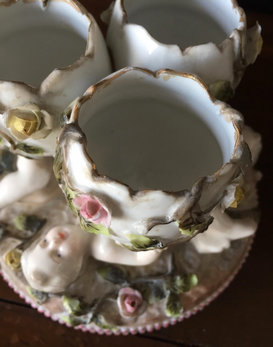 Egg Cups Forming A Group Of Porcelain Cherubs-photo-1
