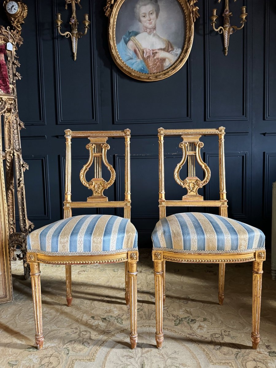 Pair Of Napoleon III Period Lyre Chairs In Gilded And Carved Wood In Louis XVI Style