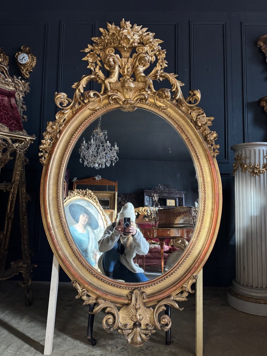 Napoleon III Period Oval Mirror In Gilded Wood With Putti Decor - 19th Century