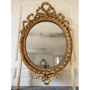 Miroir Ovale D’époque Napoléon III En Bois Doré Et Sculpté à Décor De Noeuds - XIXe Siècle 