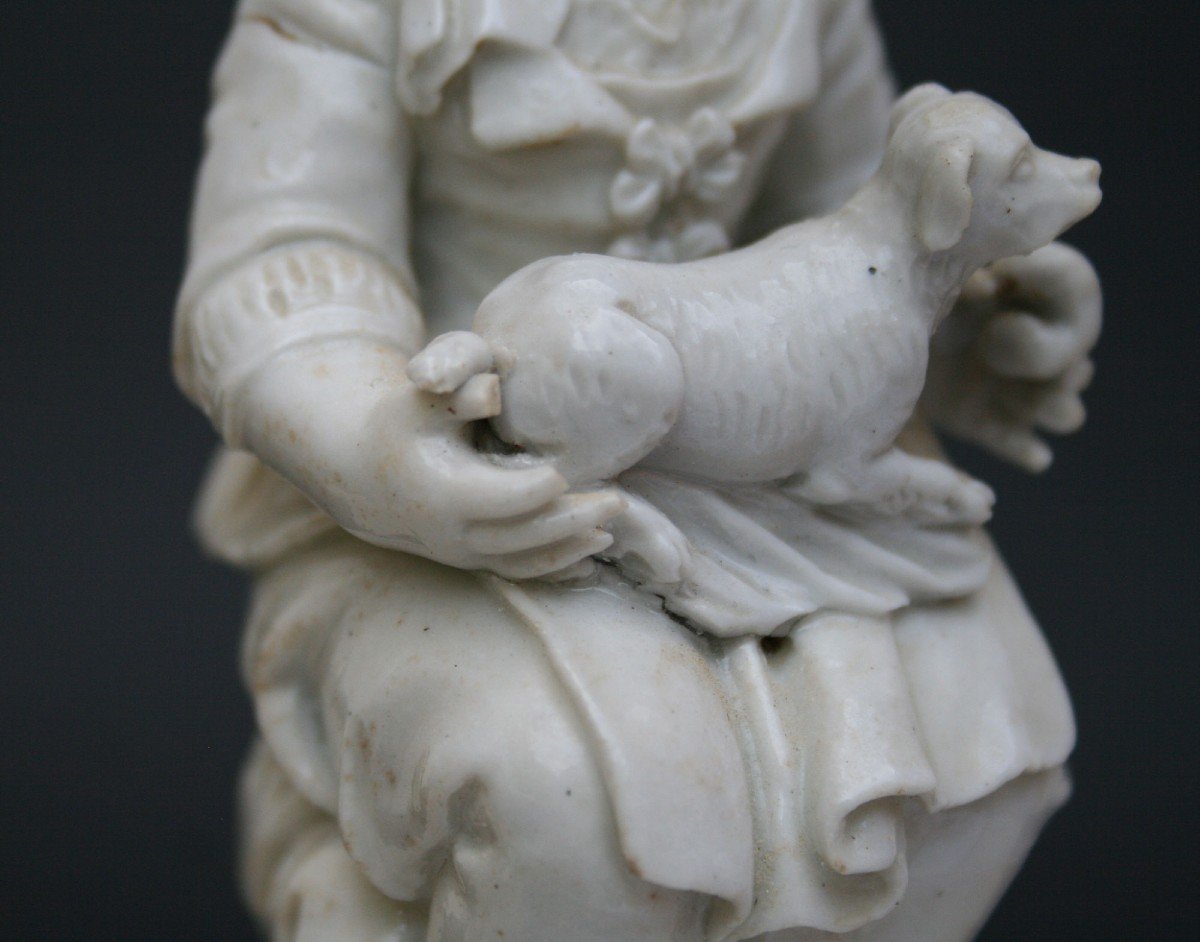 Italian White Glazed Porcelain Figure Of A Girl With A Dog Eighteenth Century-photo-1