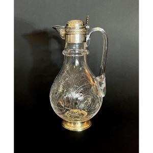 An Antique French Sterling Silver And Engraved Crystal Glass Claret Jug.
