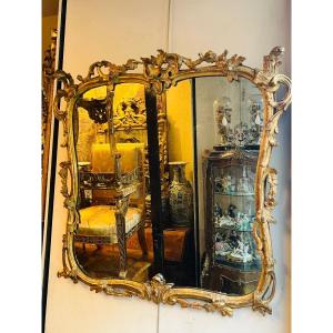 18th Century Mirror In Golden And Carved Wood