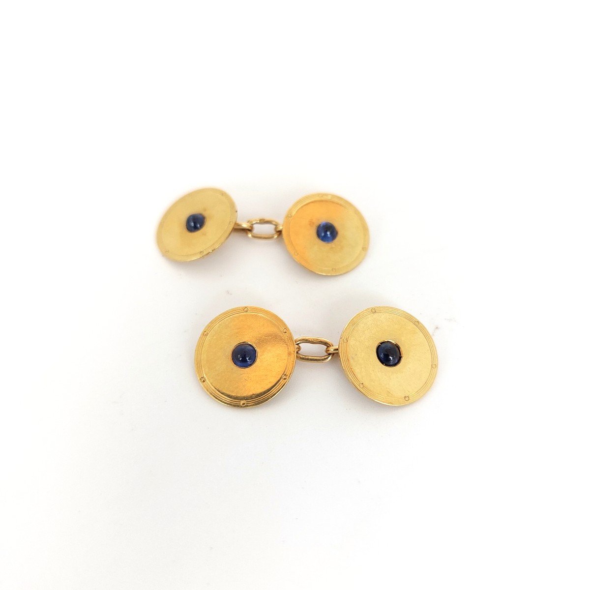 Pair Of “discoboles” Cufflinks, 18k Yellow Gold And Sapphires