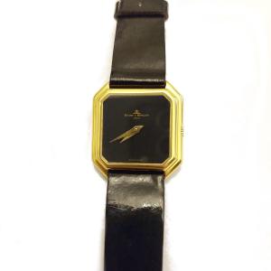 Baume Et Mercier  Montre De Poignet En Or Jaune. 