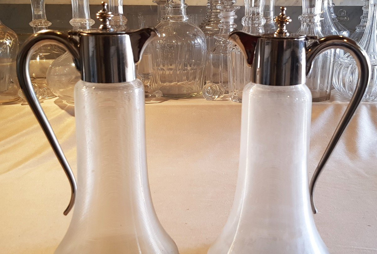 Pair Of Cuspidate Glass Jugs With Metal Handle And Pourer-photo-3