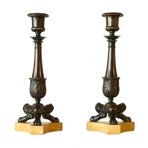 A Pair Of Restauration Patinated Bronze Tripod Candlesticks. Circa 1830. 