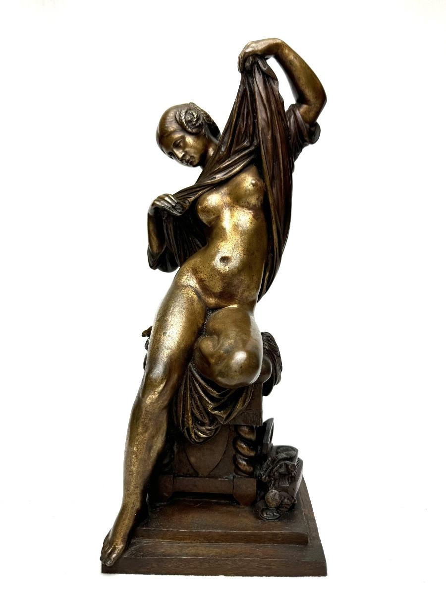 Bronze Sculpture Of A Seated Woman Undressing