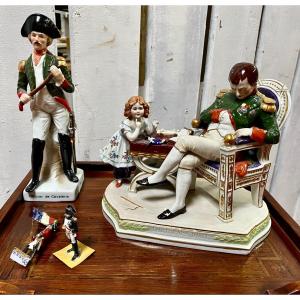 Set Of 2 Porcelain Subjects And Two Lead Soldiers