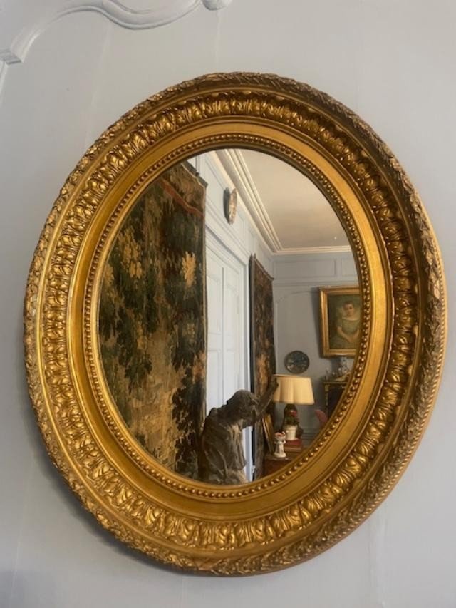 Beautiful Oval Mirror In Wood And Gilded Stucco From The 19th Century