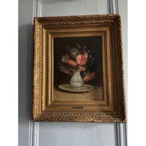 Charmante huile sur toile figurant un bouquet de fleurs dans un vase d'époque 19 ème