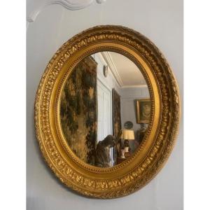 Beautiful Oval Mirror In Wood And Gilded Stucco From The 19th Century