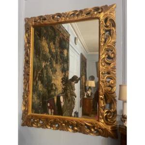 Exceptionnel miroir Italien en bois doré d'époque 19 ème