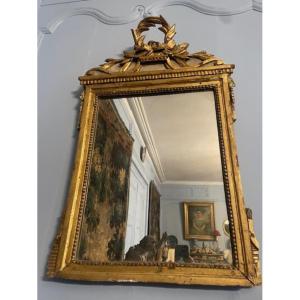 Miroir d'époque Louis XVI en bois doré