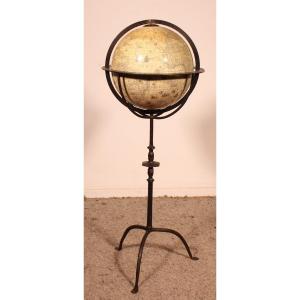 A Library Terrestrial Globe With Wrought Iron Base