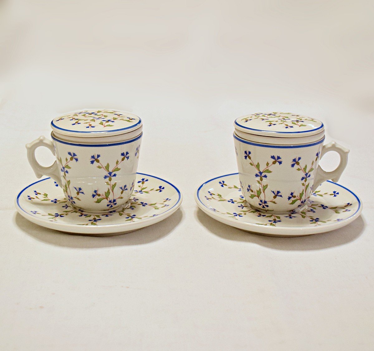 Pair Of Porcelain Teapots With Barbel Decor