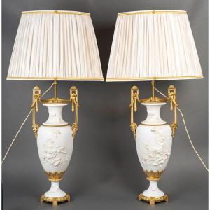 A Pair Of Biscuit And Gilt Bronze Lamps, 19th Century 