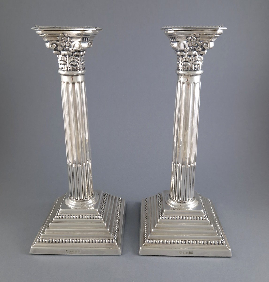 Pair Of Sterling Silver Column Candlesticks