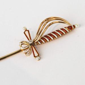 A Gold And Enamel Miniature Sword