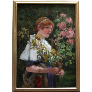 Scène dans un jardin fleuri.  par Ernst Albert Fischer-Coerlin (1853 - Berlin - 1832)