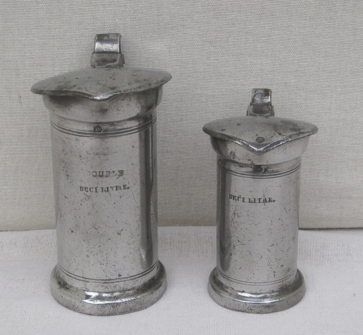 Two Pewter Measures, Covered, Homogeneous, Of The Metric System. Caen. 19th C.