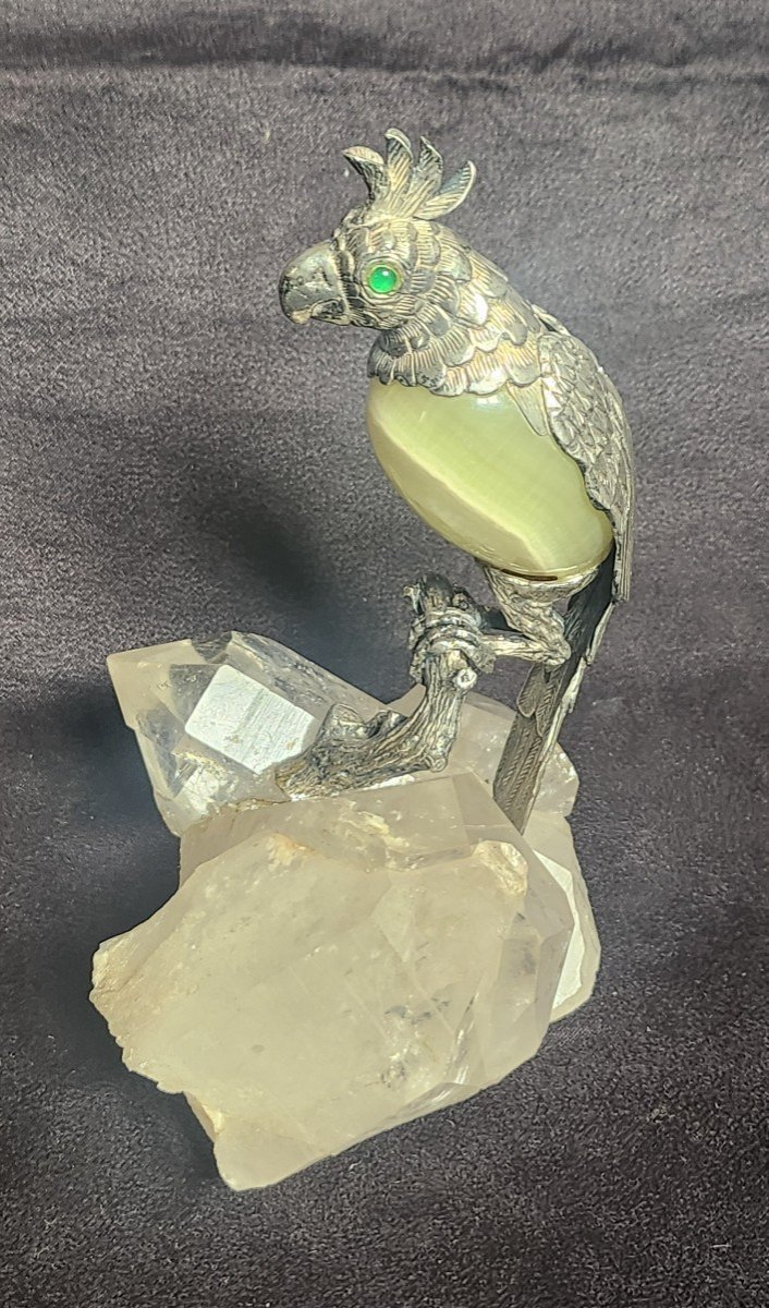 Parakeet In Silver And Stone On A Crystal Rock