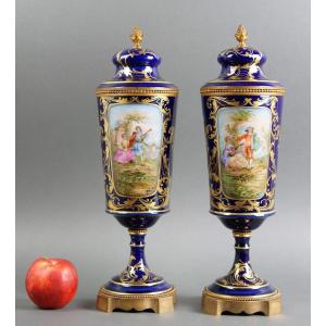 Early 20th Sevres Style Pair Of French Blue Porcelain And Gilt Bronze Vases 