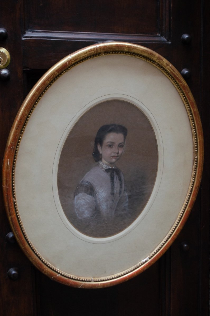 Portrait Of A Young Girl In A Lilac Dress With A Black Bow. Circa 1860.-photo-2