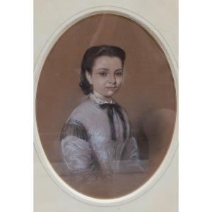 Portrait Of A Young Girl In A Lilac Dress With A Black Bow. Circa 1860.