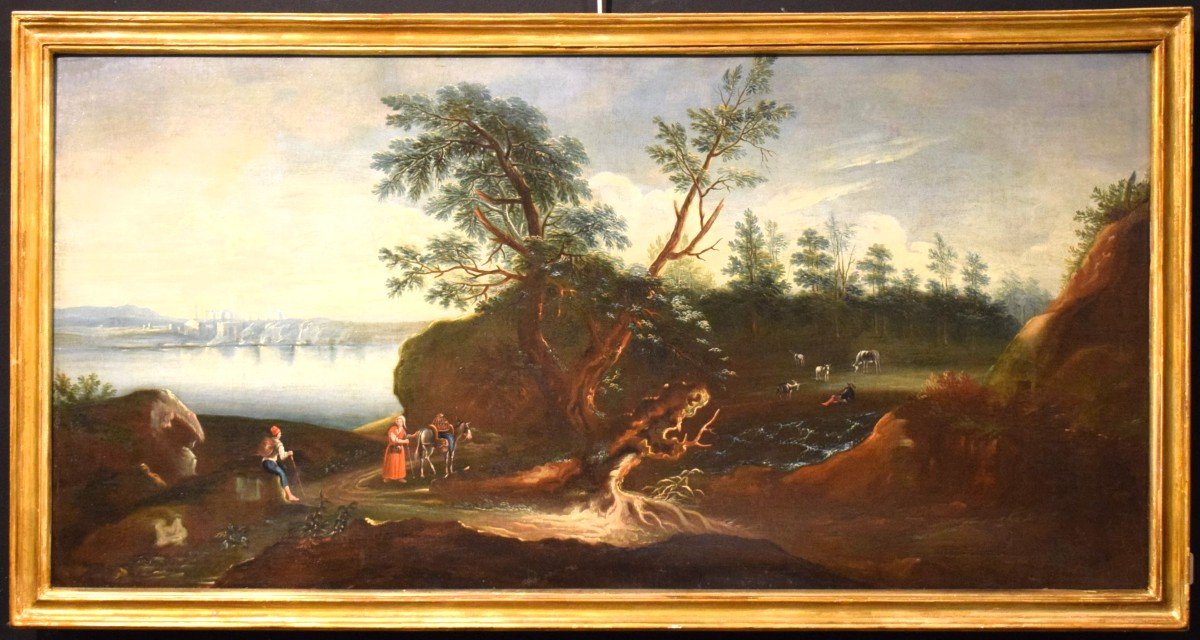 Antonio Diziani (Venise 1737-1797) atelier -  Paysage lacustre avec forêt et personnages.