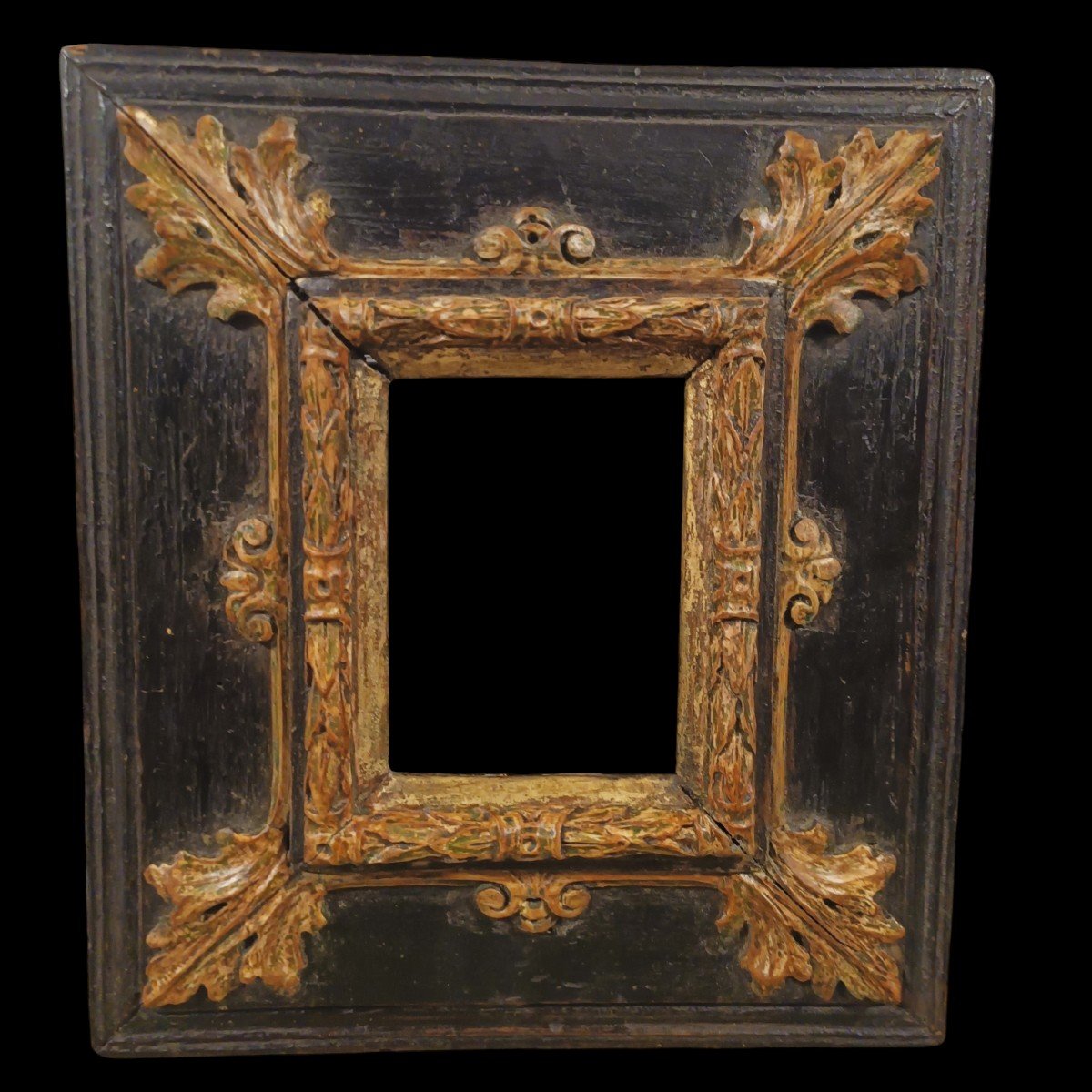 Frame In Carved Gilded And Ebonized Wood.lombardy,17th Century.