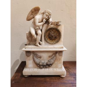 Alabaster Clock Carved With Putto. 19th Century.
