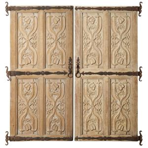 Pair Of Sculpted And Paneled Wooden Doors With Stylized Elements With Iron Hinges XVII Century