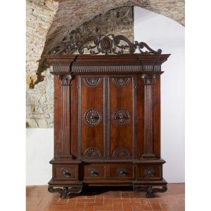 Farnesiano Wardrobe In Carved Walnut Parma, 17th Century