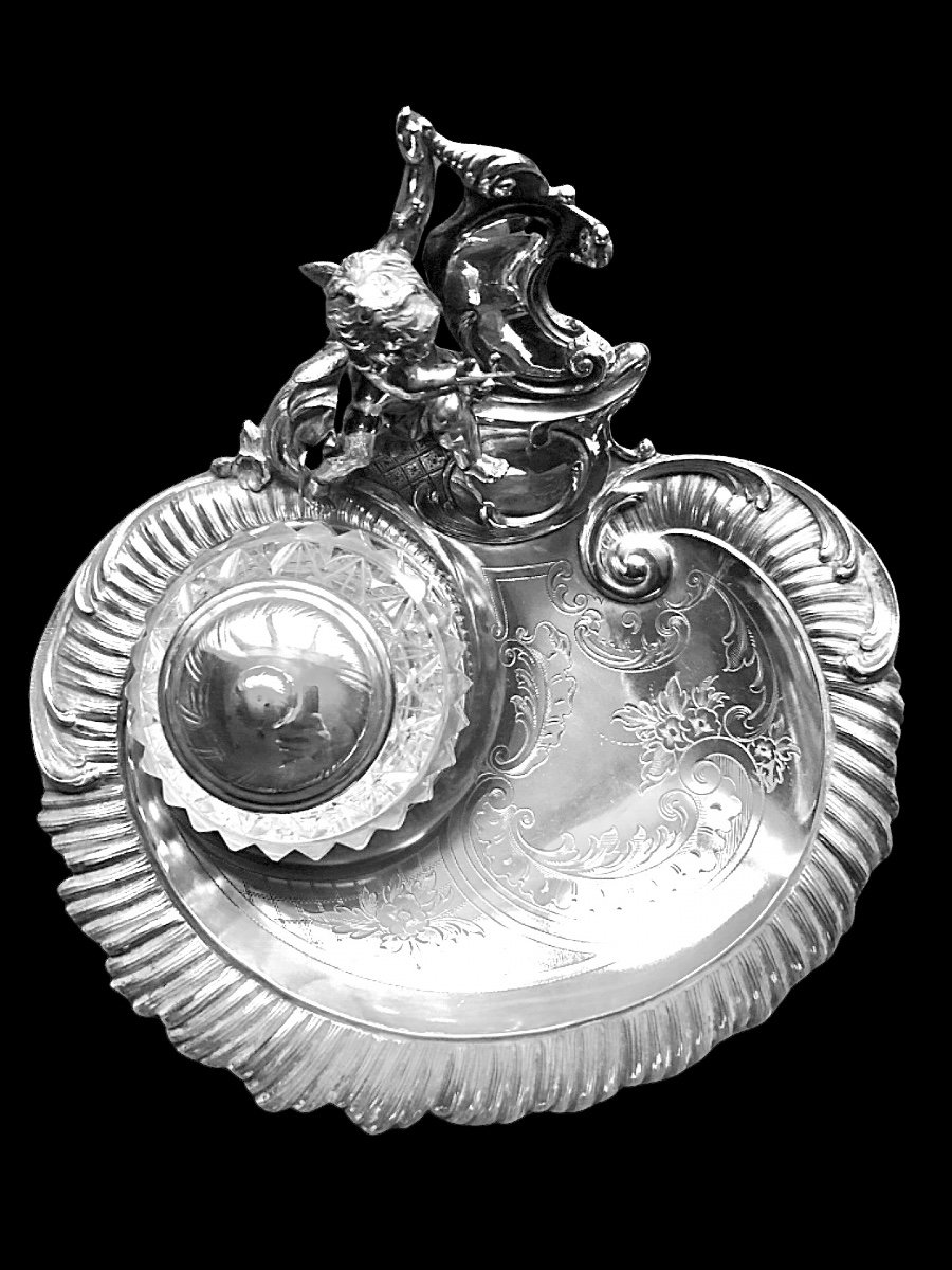 Silver And Crystal Inkwell With Engraved Floral And Rocaille Motifs And A Writing Angel. 