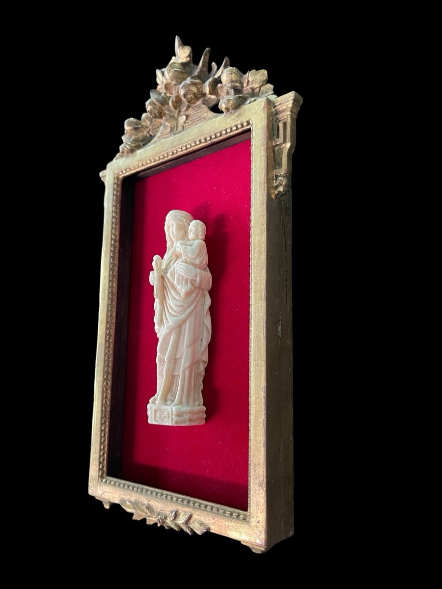 Ivory Bas-relief Sculpture Depicting Madonna And Child. -photo-1