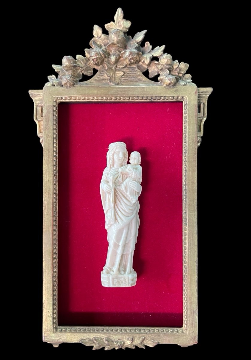 Ivory Bas-relief Sculpture Depicting Madonna And Child. 