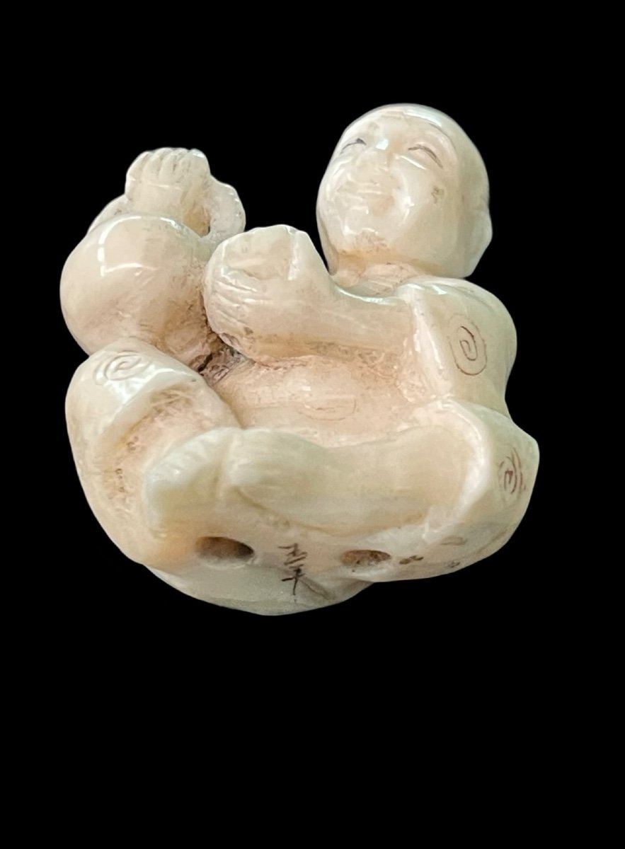 Ivory Netsuke Depicting A Seated Male Figure Pouring Tea. -photo-2