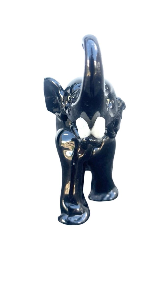 Black Glass Elephant With Milk Glass Tusks. Toso.-photo-3