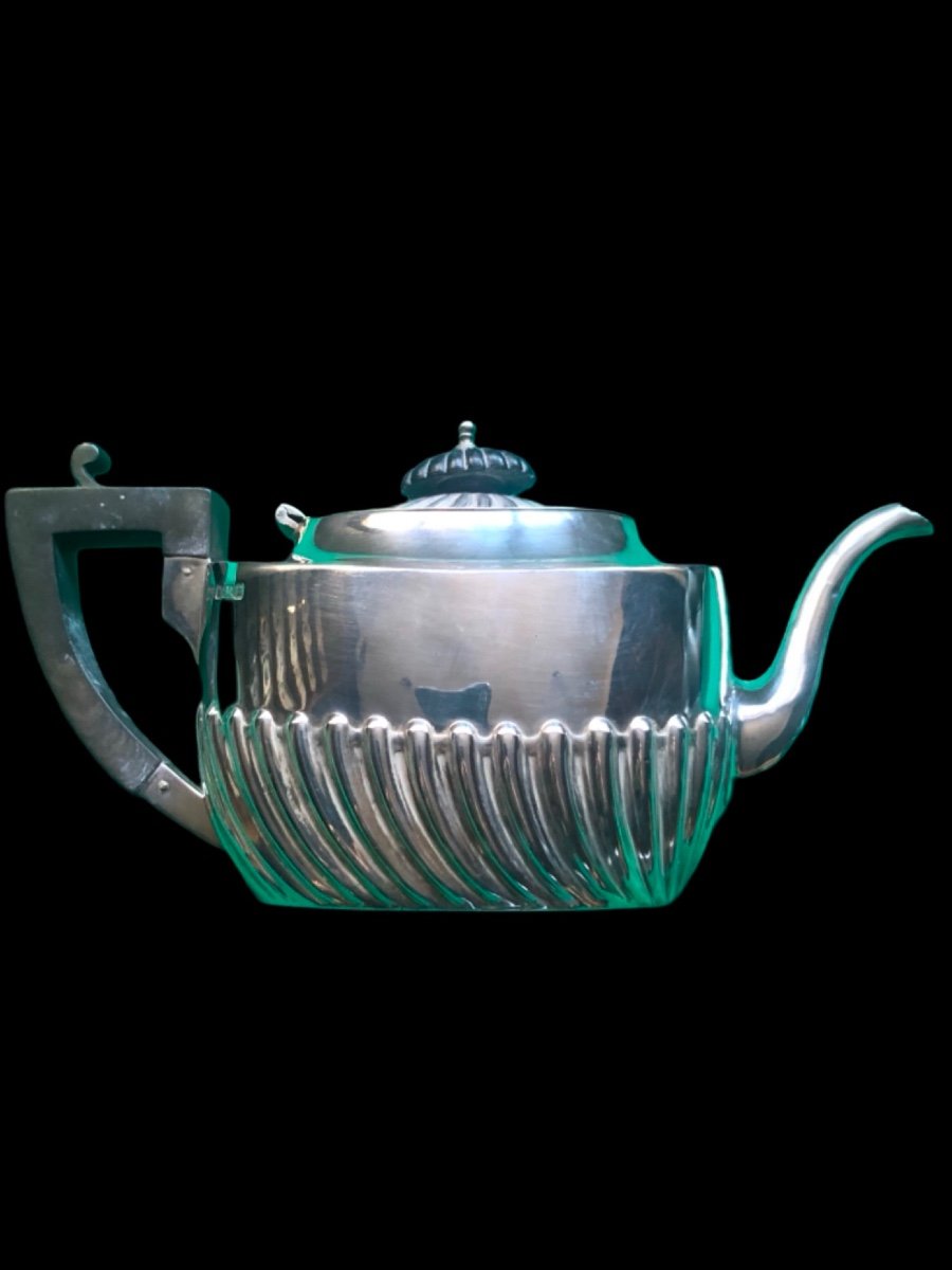 Silver Teapot With Art Nouveau Decorative Motifs And Ebony Handle. Sheffield, England 1907. 