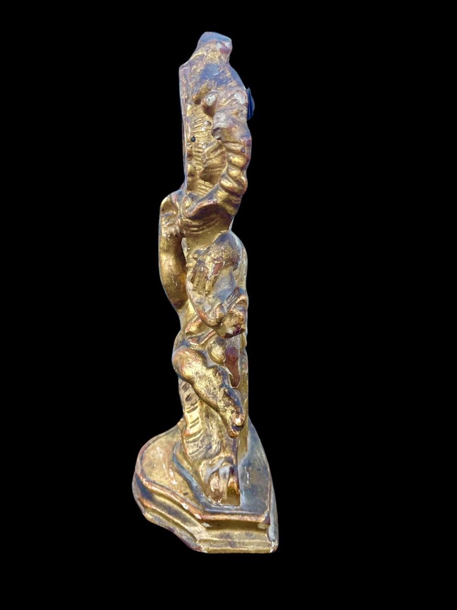 Carved Wooden Clock Stand With Gold Leaf Depicting A Child -photo-1