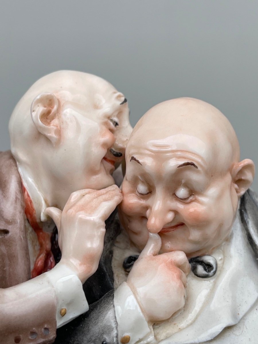 Caricature Porcelain Sculpture Depicting A Couple Of Friends Whispering To Each Other. -photo-1