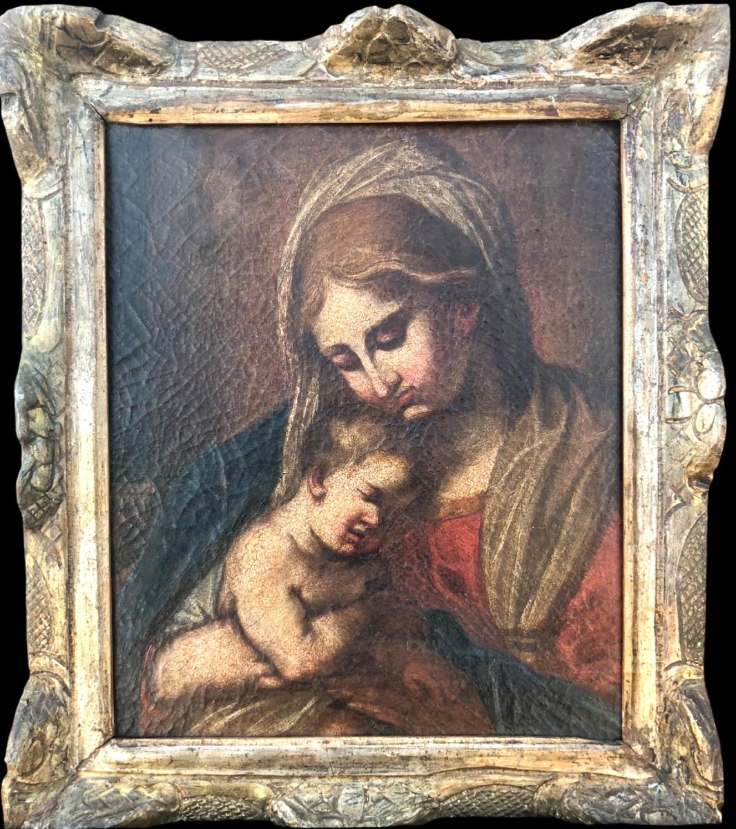 Peinture à l'huile sur toile représentant la Vierge à l'Enfant Jésus. 