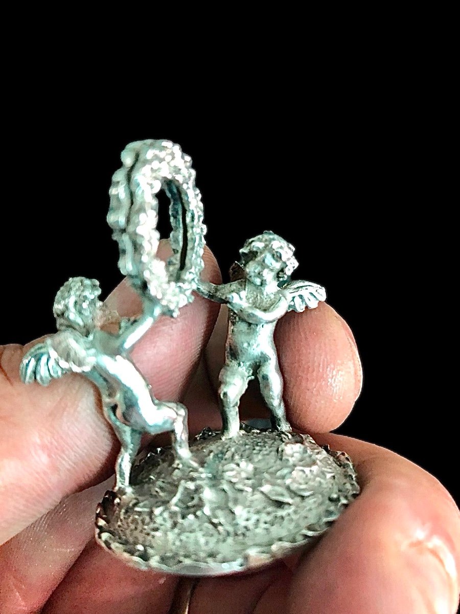 Set Of Six Silver Place Markers With A Pair Of Cherubs Holding A Garland. Im-photo-2