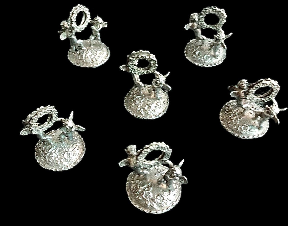 Set Of Six Silver Place Markers With A Pair Of Cherubs Holding A Garland. Im