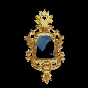 Miroir En Bois Sculpté Avec Motifs Végétaux, Rocaille Et Feuille d'Or.venise.